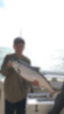 Conner with first fish of the day